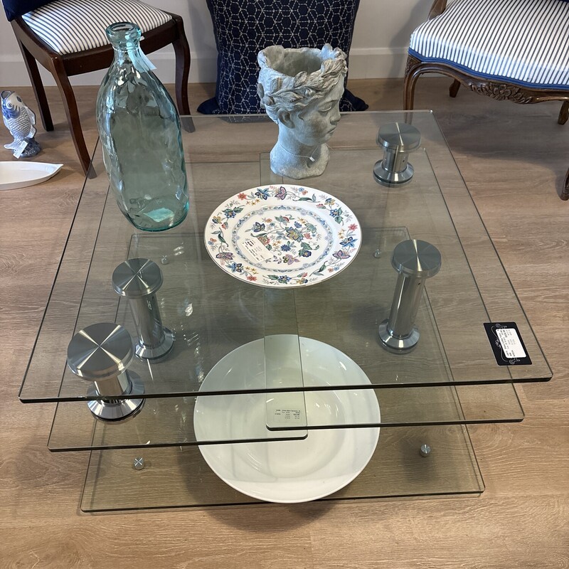 Glass Motion Coffee Table
Tauranac
Clear Silver
Size: 31W X 31D X16 H in