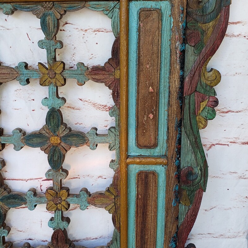 Antique handpainted carved wood headboard. Possibly Scandinavian in origin. The headboard has worn paint, but in good condition for its age. The back is wired to make a unique wall hanging. Size: 60x48