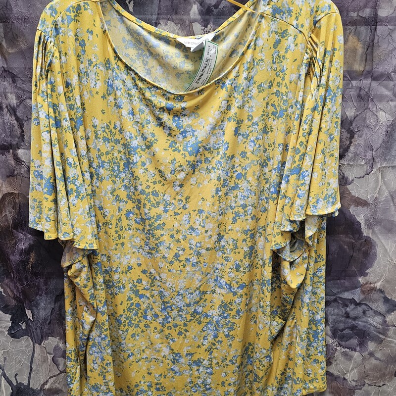 Short sleeve blouse in yellow with blue floral design