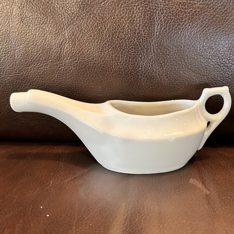 Vtg Invalid/Infant Feeder
size: 7 x 3 x 3
This feeder was used to feed milk or broth to patients.  It is white porcelain with no chips or cracks.  It was made in Japan.