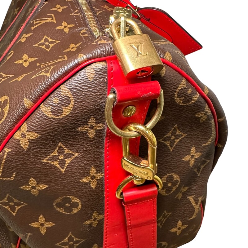 Louis Vuitton Keepall 50 Red<br />
<br />
Dimensions:<br />
19.7 x 11.4 x 9.1 inches<br />
(length x Height x Width)<br />
<br />
Date Code: SD3230<br />
<br />
Note: Stains inside the bag (see photos)<br />
<br />
The Keepall Bandouliere 50 travel bag is made from Monogram Macassar canvas with colored-leather top handles, lateral bands, and name tag. The inside is lined with textile in the same bright color for a bag that’s as joyful as it is functional. The generously sized Keepall 50 can be brought onto the plane as carry-on luggage.