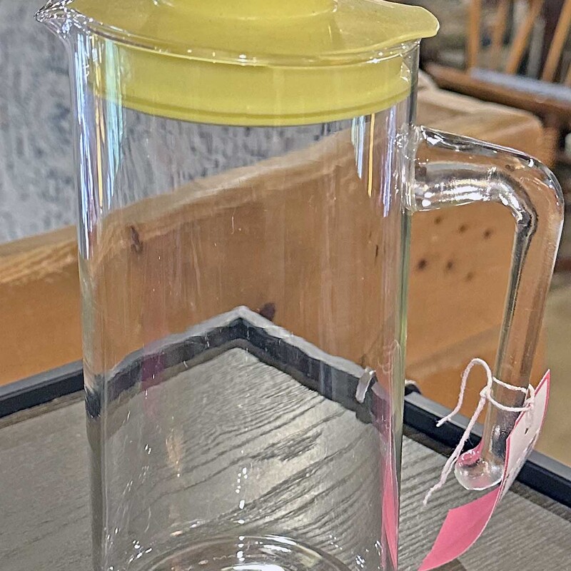 Vintage Pyrex Glass Pitcher

Yellow Cover
8 In Tall

Great for Juice or Drink Mix!