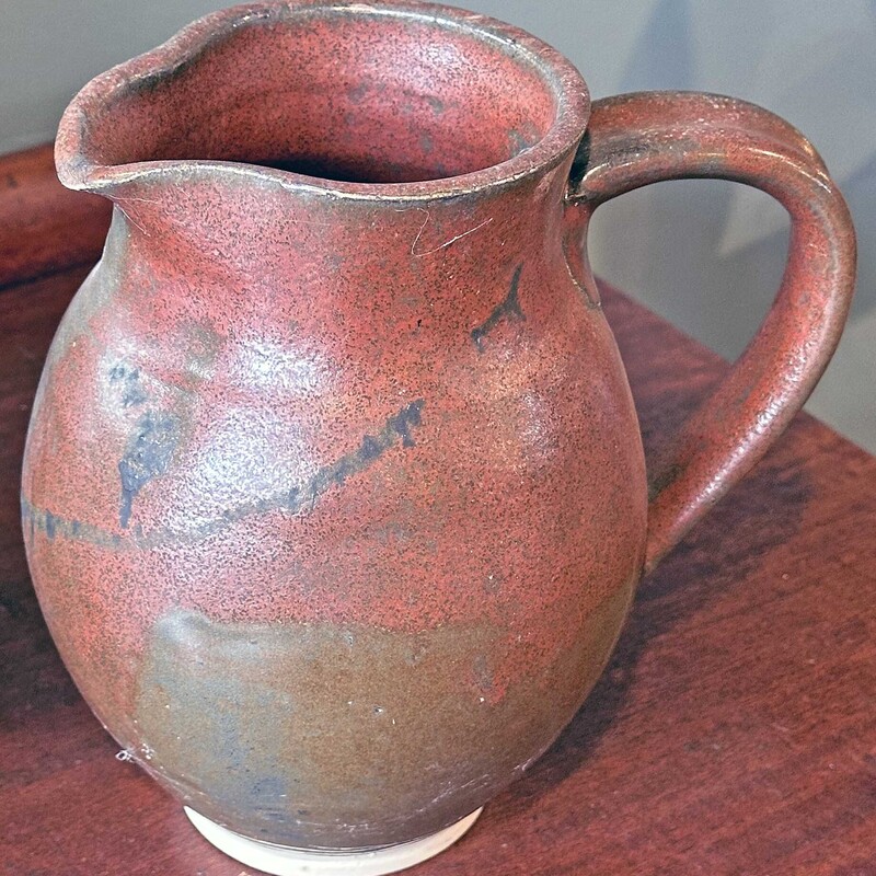 Handmade Brown/Copper Pottery Pitcher

7 In Tall
Locally Made
