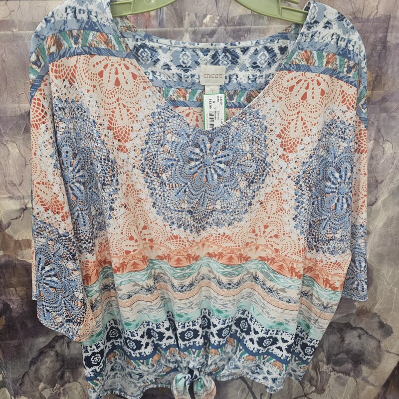 Half sleeve summer blouse in a multi colored print.