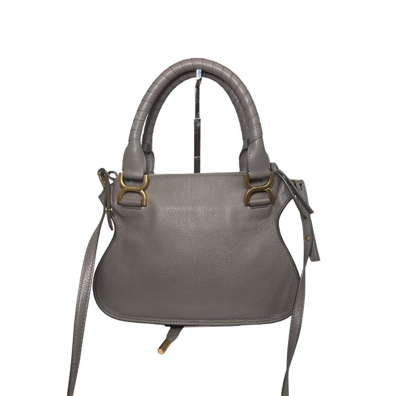 Chloé Marcie Satchel, Grey, Size: Small<br />
<br />
Dimensions:<br />
11.75W x 9H x 3.5D<br />
<br />
Combining a feminine allure with '70s spirit, Chloé's iconic Marcie bag is skillfully crafted in Italy of grained leather. The French label details this slouched silhouette with equestrian-inspired saddle stitching and signature tassels.