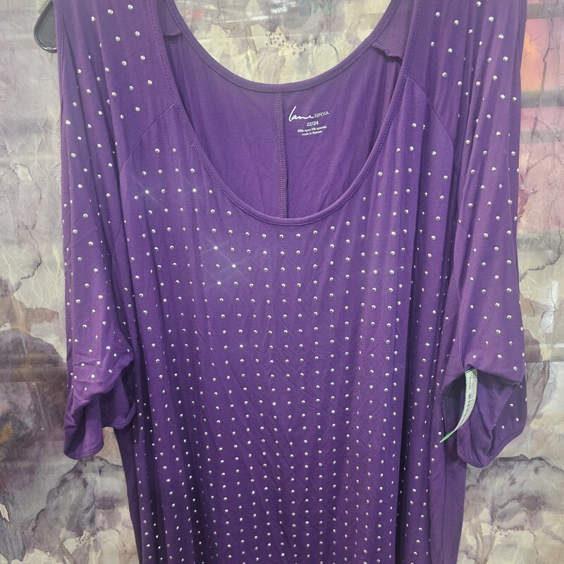 Half sleeve cold shoulder knit top in purple with metallic studding on the front.