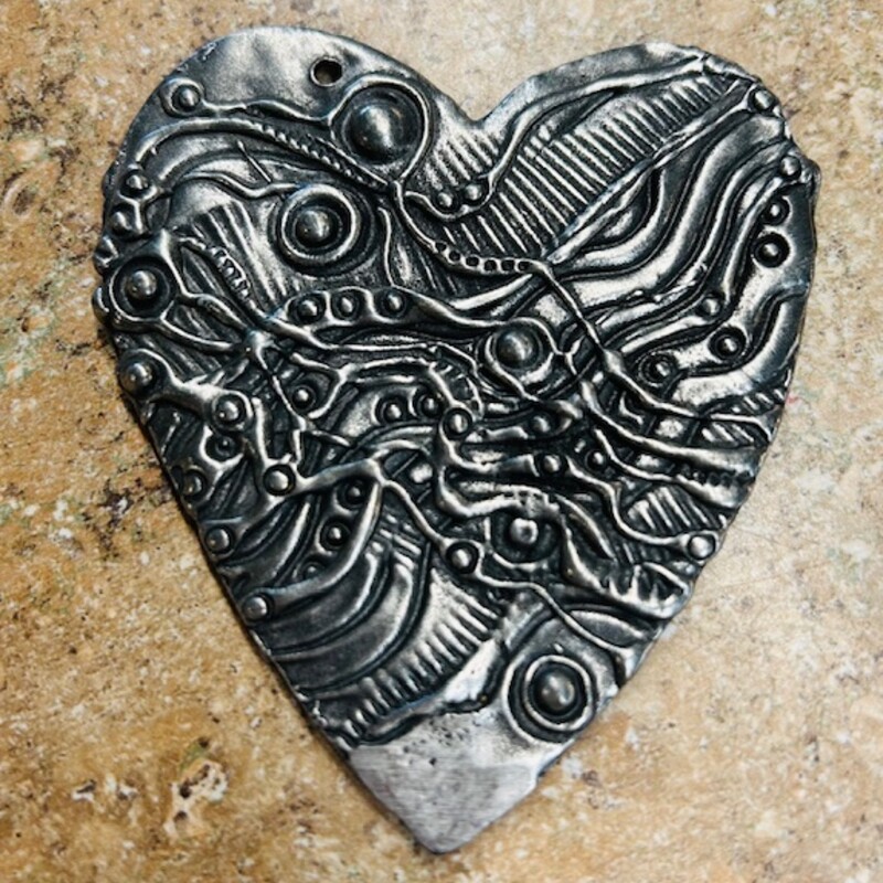 Don Drumm Heart Ornament
Silver
Size: 3x3H