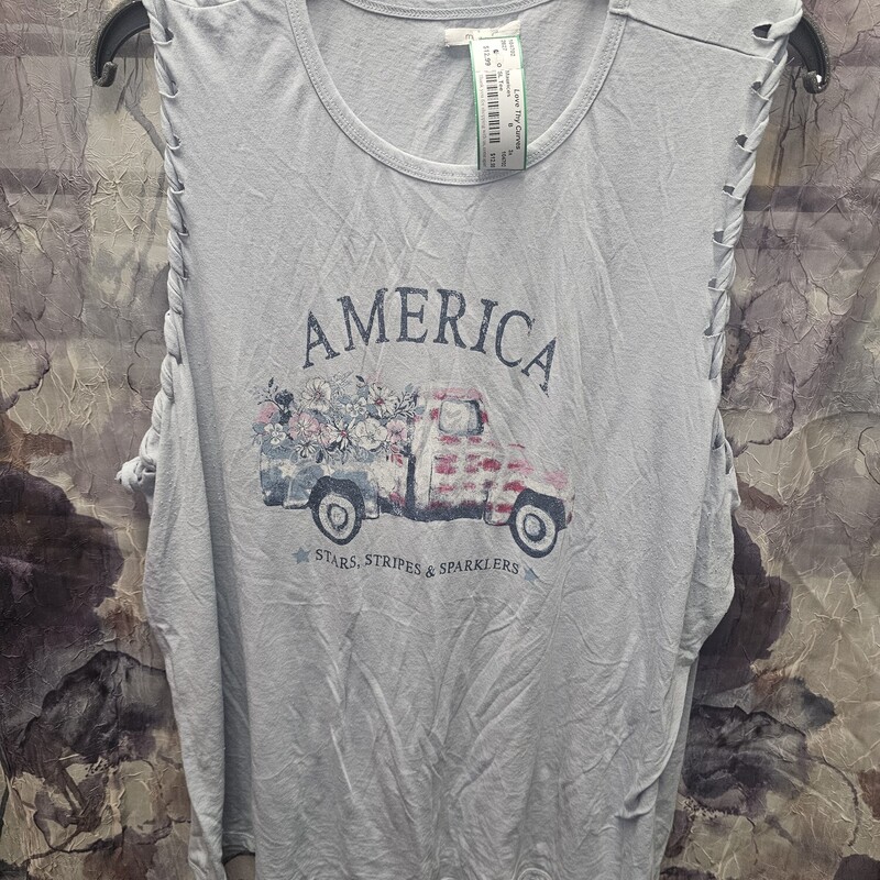 Sleeveless tee in light blue with patriotic graphic on the front.