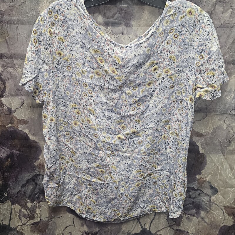 Short sleeve light blue blouse with cute floral print.
