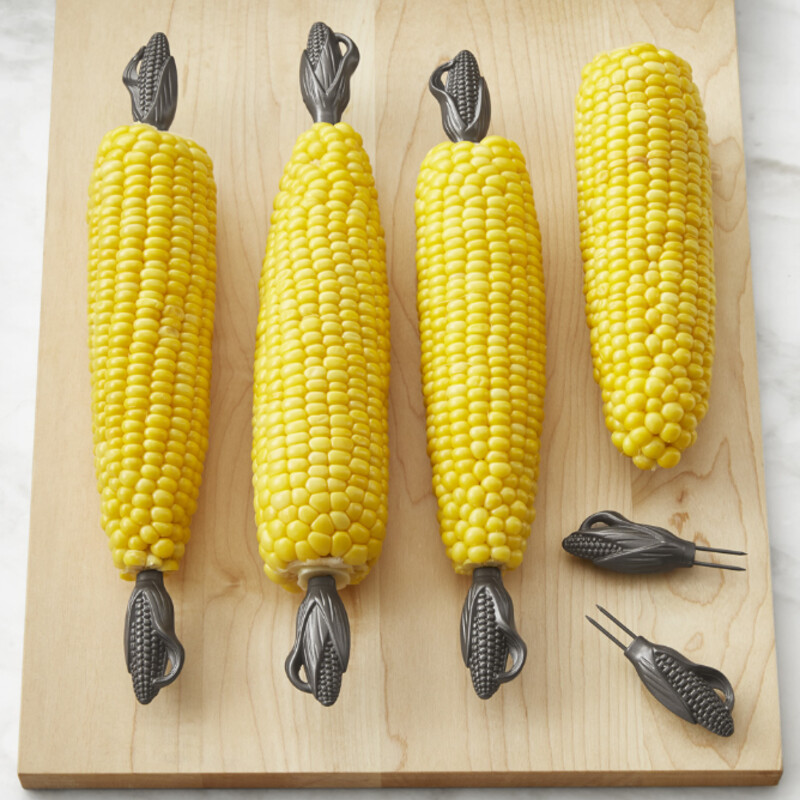 Williams Sonoma Corn Picks
Silver
Size: 8pc/Box
Great for picnics and barbecues, these handy tools make it easy to hold a piping-hot ear of corn without risking burned or buttery fingers. Sharp stainless-steel prongs hold corncobs securely. Handles are molded in the shape of freshly harvested corn. Set of eight holders (four pairs). Designed and developed for Williams Sonoma.