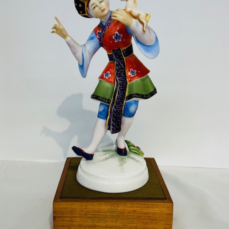 Royal Doulton Chinese Dancer
Comes with original box
Orange, Green,  Blue
Size: 5x10H
