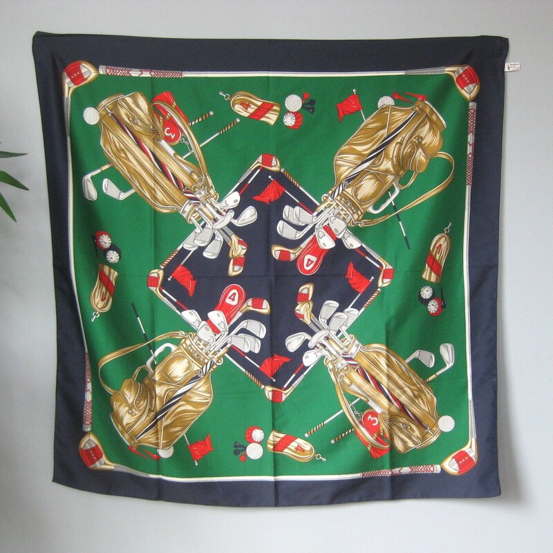 Vtg Golf Theme, Grn/Navy, Size: None
Vibrant Golf Themed scarf by Symphony Scarf
made in Italy
Green, Navy Blue, Gold, white and red
Bold renderings of Golf bags, club coverups , tees and other golf things.
Perfect condition!
Great gift for the Golfer in your life.

100% polyester.
34 x 34

Thanks for looking!
#69921