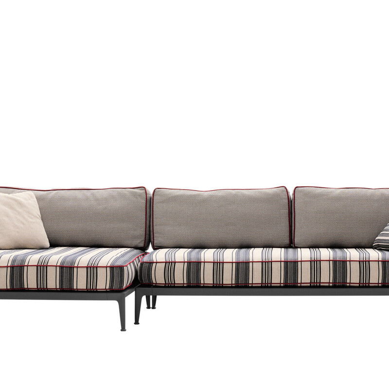 B&B Italia Ribes Outdoor Sectional Sofa<br />
<br />
Size: 134Lx51Dx25T<br />
<br />
Ribes is a modular seating system that focuses on versatility, colour and research into materials. The starting point is a futon base with flexible glass fibre slats resting on an aluminium frame to which two types of armrest or backrest can be attached as desired: one with a polypropylene fibre interlacing, the other with a roller cushion. On top are seat cushions intended as comfortable mattresses to stretch out on and several shapes of back and armrest cushion, all containing a new upholstery giving Ribes a particularly lived-in and soft look. Ribes means transformation and is especially suited to those areas that are neither inside nor outside: verandas, shady patios, under a loggia or on a covered terrace, allowing a fluid approach to the open spaces in the home.