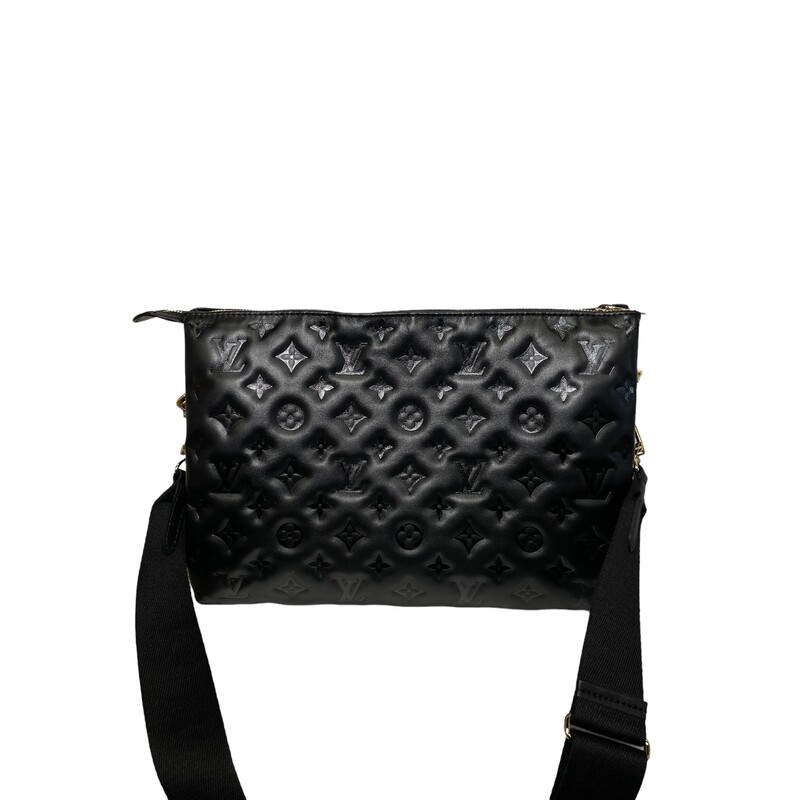 Louis Vuitton Coussin, Black,

Size: MM

Dimensions:
13.4 x 9.4 x 4.7 inches
(length x Height x Width)

Date Code: Microchipped

The most eye-catching bag of the Fall-Winter 2021 collection, the Coussin MM handbag is fashioned from puffy lambskin, embossed with a Monogram pattern. Voluminous, soft and supple, the bag almost feels like a pillow. An adjustable textile strap allows for shoulder and cross-body carry, while the new Edge Chain invites fashionable under-the-arm styling.

Strap:Removable, adjustable
Strap drop:11.8 inches
Strap drop max:19.7 inches
Chain:Removable
Chain drop:11.8 inches
Chain drop max:19.7 inches