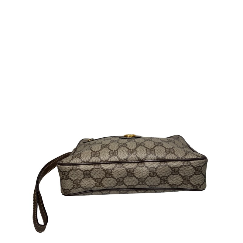 Gucci Vintage Wristlet Pouch
Coated Canvas with leather trim and strap
Code: 018.123.6021
Dimensions: W 9.1 x H 5.9