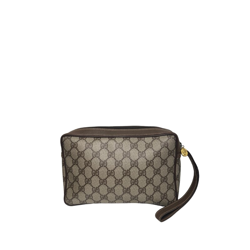 Gucci Vintage Wristlet Pouch
Coated Canvas with leather trim and strap
Code: 018.123.6021
Dimensions: W 9.1 x H 5.9