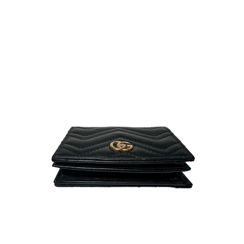 Gucci GG Marmont Wallet<br />
<br />
Dimensions:<br />
Closed: 4.5W x 3.5H x 1D<br />
Open: 4.5W x 7H<br />
<br />
Five card slots<br />
One bill compartment<br />
One zip pocket<br />
One zip pocket<br />
Interior open pocket<br />
Snap closure