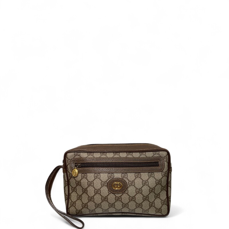 Gucci Vintage Wristlet Pouch
Coated Canvas with leather trim and strap
Code: 018.123.6021
Dimensions: W 9.1 x H 5.9