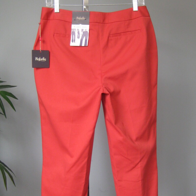 Smart pair of capris for work, play or travel in a trendy color.<br />
Pink Terracotta<br />
58% cotton, 39% poly, 3% spandex<br />
size 6<br />
cute studs at the end of the legs<br />
flat measurements:<br />
waist: 17.25<br />
hip: 21<br />
inseam: 21.25<br />
rise: 9.5<br />
side seam: 32<br />
<br />
perfect condition, new with tags<br />
Thanks for looking!<br />
#69820