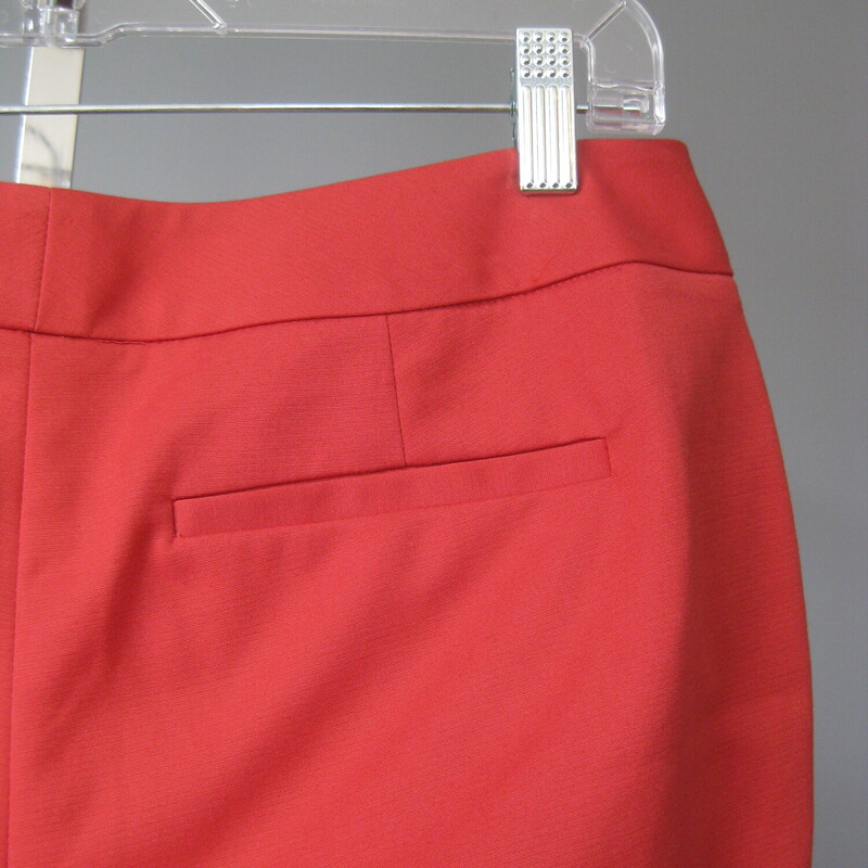 Smart pair of capris for work, play or travel in a trendy color.<br />
Pink Terracotta<br />
58% cotton, 39% poly, 3% spandex<br />
size 6<br />
cute studs at the end of the legs<br />
flat measurements:<br />
waist: 17.25<br />
hip: 21<br />
inseam: 21.25<br />
rise: 9.5<br />
side seam: 32<br />
<br />
perfect condition, new with tags<br />
Thanks for looking!<br />
#69820