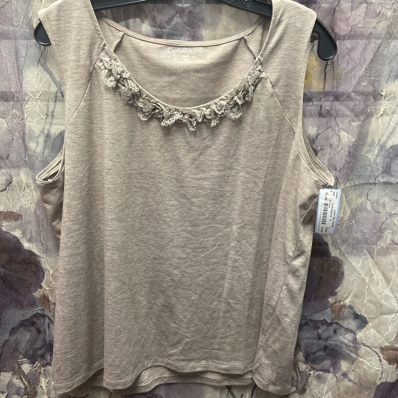 Cute knit tank with lace trim on the neckline.