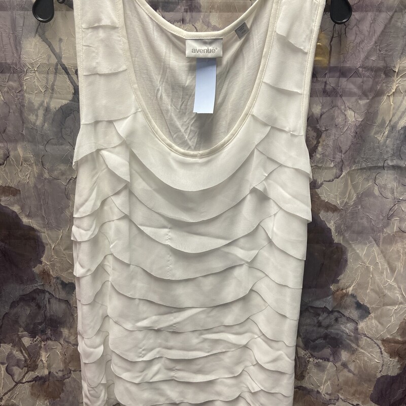 Super cute layered with ruffles tank with solid knit backing.