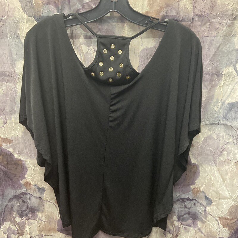 Short sleeve blouse in black with rivets in the back panel for added flair.