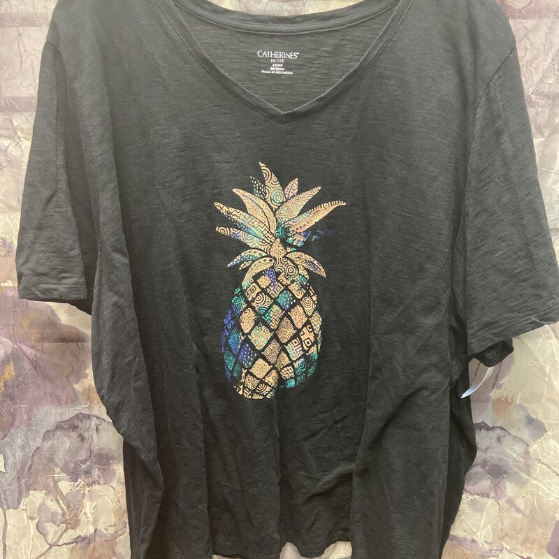 Black tee with pineapple graphic on the front.