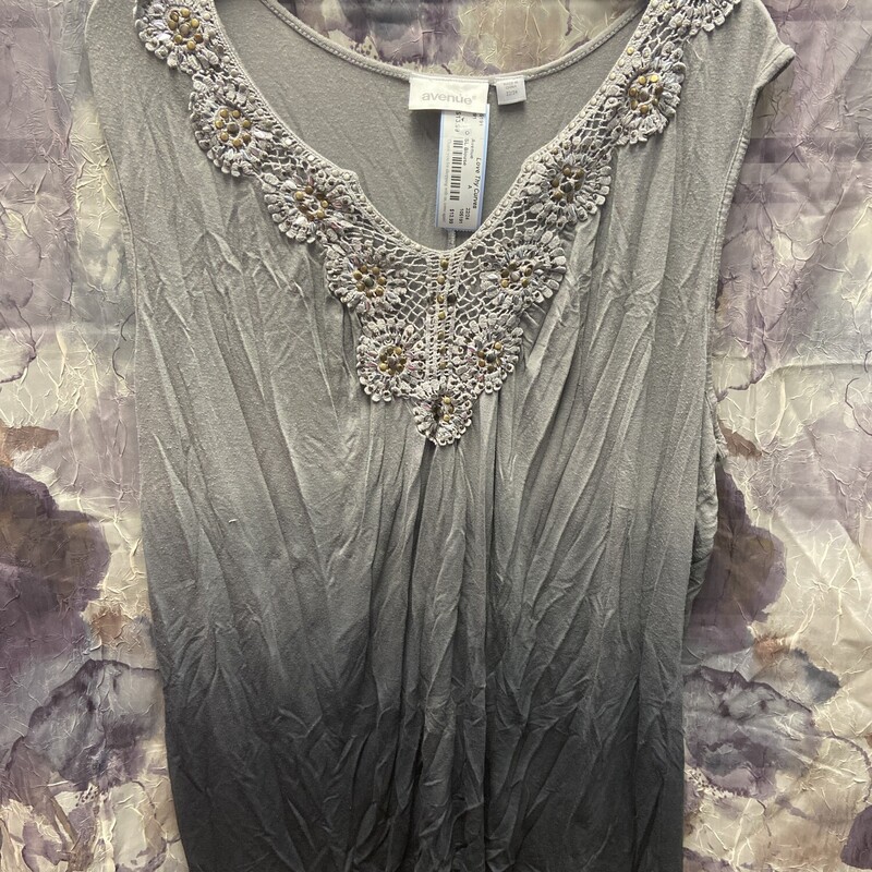 Sleeveless knit top in grey ombre with embroidered lace and metallic studding on the neckline.