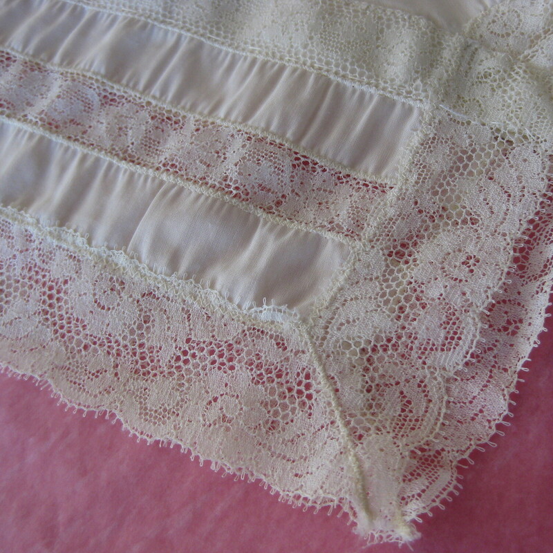 Vtg Barbizon Half Slip, Ivory, Size: Medium
Pretty half slip in yellowy cream with tiers of lace trim.
two slits
Good vintage condition, plenty of snap to the elastic waist
It has some discolorations, pls see last photo.  very faint.
100% Nylon, made in the USA
by Barbizon

You can wear the slip with the slit in any position so it will work with any skirt or dress that has a slit, whether it's in the front back or side.

Here are the flat measurements:
Waist : 11.5 stretches comfortably to 14.
Hip: 16
Length: aprox. 25
slits: 5

 Thank you for looking.
#71630