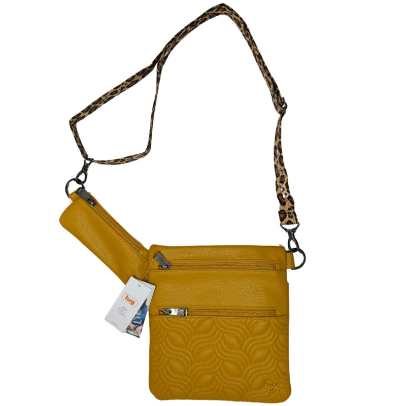 New Lug Skipper Crossbody<br />
RFID Protected<br />
Soft Lined Cellphone Pocket<br />
Quick Access Soft Pocket<br />
Vegan Leather<br />
Color: Amber