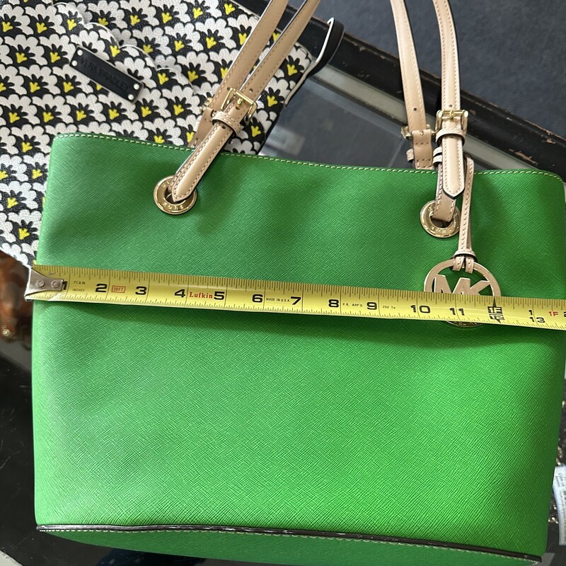 Michael Kors JetSet Bag, PalmGreen<br />
PreOwned<br />
Perfect Conditon<br />
Hard Shell,Leather 14.25in wide at center,Bottom of Bucket is 11in wide, 7in front to back on bottom<br />
Purse depth 10.25in(top to bottom)<br />
All Sales Are Final. No Returns<br />
<br />
Shipping Is Available<br />
or<br />
In Store Pick Up Within 7 Days of Purchase<br />
<br />
Thank You for Shopping With Us :-)