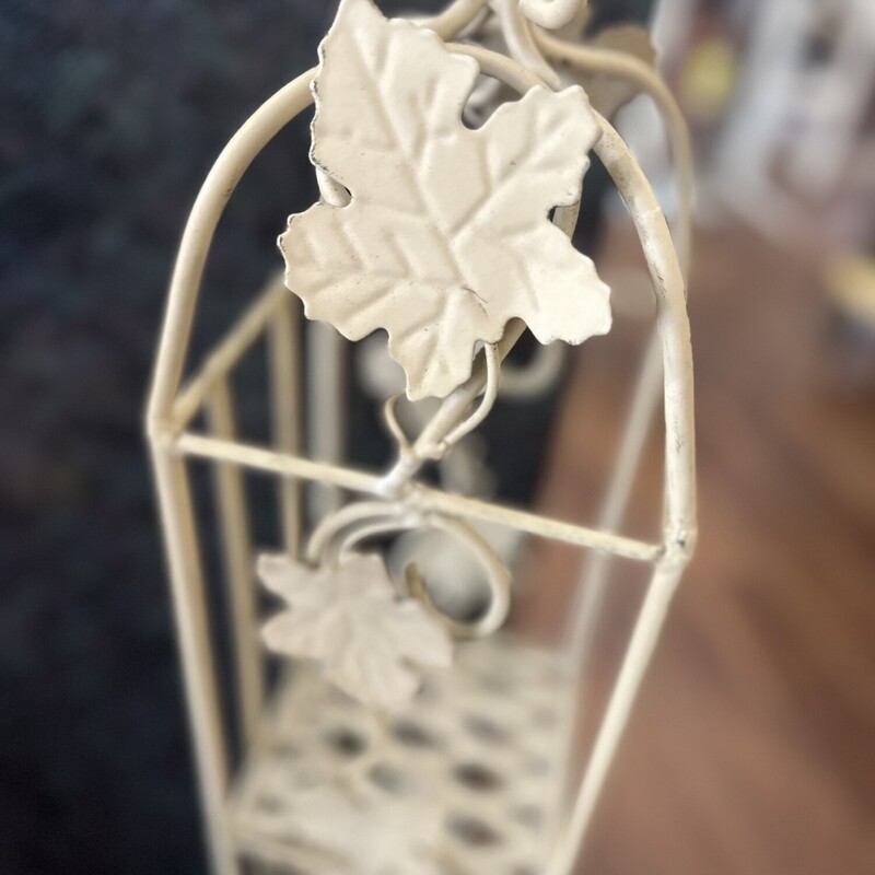 Wrought Iron Leaf Stand, White, Size: 36inX6in
Each side measures 6inches
Beautiful antiqued white wrought iron stand

All Sales Are Final. No Returns

In Store Pick Up Within 7 Days of Purchase

Thank You for Shopping With Us :-)