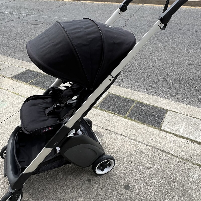 Bugaboo Ant Stroller, Black, Size: NB-50LBS<br />
<br />
Unbeatable versatility in a compact size<br />
<br />
The Bugaboo Ant is an ultra compact stroller packed with incredible features designed to provide versatility and ease for you and your family. Its lightweight frame makes it easy to drive while its height-adjustable comfort seat lets your child face you or the world in one simple switch. A true joy to ride and steer, and ready to go from your very first stroll.<br />
<br />
Two-view seat<br />
<br />
An extraordinary stroller needs an extraordinary seat. This easily adjustable and reversible seat lets your child face you or the world in one easy switch.<br />
<br />
Ultra compact fold<br />
<br />
It’s convenient to store out of sight, park in small spaces, or fit in an overhead locker where you would usually keep a bag.<br />
<br />
Grows with your family<br />
<br />
The height-adjustable seat lets you have a safe, comfortable, and seamless ride from newborn to toddler. For extra comfort during the first months, pair your stroller with the Bugaboo baby cocoon.<br />
<br />
Easy to drive<br />
<br />
As your newborn grows into a lively toddler, your push can remain as gentle as ever thanks to the advanced suspension packed into its nimble wheels.<br />
<br />
<br />
<br />
Key features<br />
<br />
Perfect as a second stroller<br />
Suitable from birth, for extra comfort pair with the Bugaboo Baby Cocoon<br />
Car seat compatible<br />
Lightweight and easy to carry<br />
Folds in one-piece into an ultra compact size<br />
Pull-along trolley mode<br />
Advanced suspension for fewer bumps<br />
Suitable for a child up to 22 kg<br />
Comfortable and fully reclinable seat, featuring three different positions<br />
Reversible seat, with parent-facing or facing-the-world position<br />
Height-adjustable handlebar<br />
Push and steer with one hand<br />
Rear luggage basket holds up to 5 kg<br />
Underseat basket holds up to 3 kg<br />
<br />
Specifications<br />
<br />
<br />
Weight, size & dimensions<br />
<br />
Stroller width: 40.08 cm<br />
Stroller weight with seat: 7.2 kg<br />
Folded dimensions (length x width x height): 23 x 38 x 55 cm<br />
Minimum handlebar height: 95 cm<br />
Maximum handlebar height: 104 cm<br />
Front wheel diameter: 12 cm<br />
Rear wheel diameter: 15 cm<br />
<br />
Capacity<br />
<br />
Weight capacity (seat): up to 22 kg<br />
Combined under seat basket & rear luggage basket capacity: 8 kg/18 liters<br />
<br />
Compatibility<br />
<br />
Compatible with different car seat models. Check out our Accessories page for information about car seat adapters.<br />
<br />
Fabrics & Care<br />
<br />
Outside: 100% polyester<br />
Machine washable fabrics, at 30 degrees. Always wash it separately.