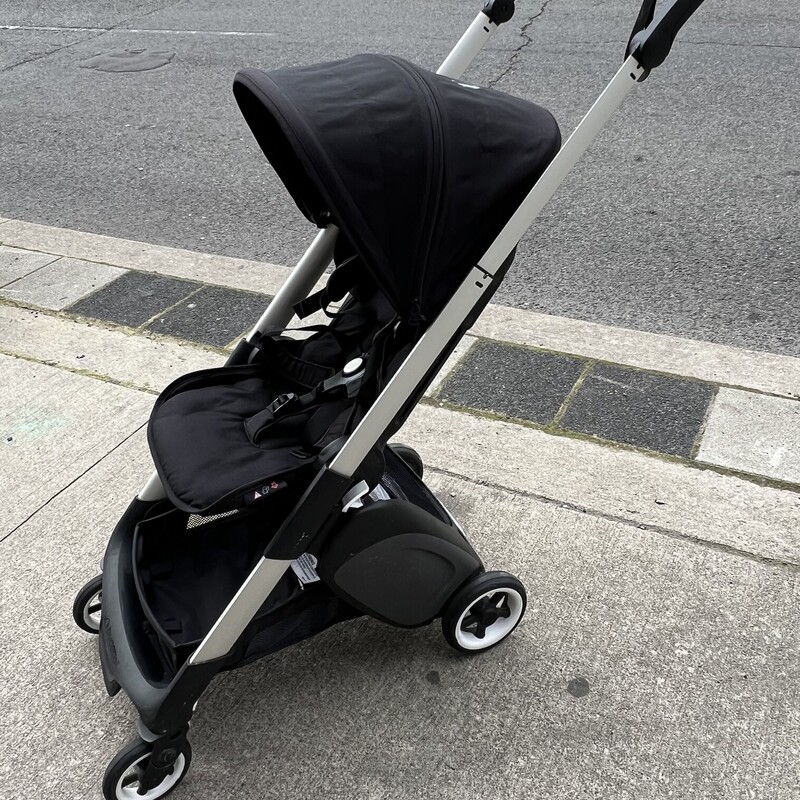 Bugaboo Ant Stroller, Black, Size: NB-50LBS<br />
<br />
Unbeatable versatility in a compact size<br />
<br />
The Bugaboo Ant is an ultra compact stroller packed with incredible features designed to provide versatility and ease for you and your family. Its lightweight frame makes it easy to drive while its height-adjustable comfort seat lets your child face you or the world in one simple switch. A true joy to ride and steer, and ready to go from your very first stroll.<br />
<br />
Two-view seat<br />
<br />
An extraordinary stroller needs an extraordinary seat. This easily adjustable and reversible seat lets your child face you or the world in one easy switch.<br />
<br />
Ultra compact fold<br />
<br />
It’s convenient to store out of sight, park in small spaces, or fit in an overhead locker where you would usually keep a bag.<br />
<br />
Grows with your family<br />
<br />
The height-adjustable seat lets you have a safe, comfortable, and seamless ride from newborn to toddler. For extra comfort during the first months, pair your stroller with the Bugaboo baby cocoon.<br />
<br />
Easy to drive<br />
<br />
As your newborn grows into a lively toddler, your push can remain as gentle as ever thanks to the advanced suspension packed into its nimble wheels.<br />
<br />
<br />
<br />
Key features<br />
<br />
Perfect as a second stroller<br />
Suitable from birth, for extra comfort pair with the Bugaboo Baby Cocoon<br />
Car seat compatible<br />
Lightweight and easy to carry<br />
Folds in one-piece into an ultra compact size<br />
Pull-along trolley mode<br />
Advanced suspension for fewer bumps<br />
Suitable for a child up to 22 kg<br />
Comfortable and fully reclinable seat, featuring three different positions<br />
Reversible seat, with parent-facing or facing-the-world position<br />
Height-adjustable handlebar<br />
Push and steer with one hand<br />
Rear luggage basket holds up to 5 kg<br />
Underseat basket holds up to 3 kg<br />
<br />
Specifications<br />
<br />
<br />
Weight, size & dimensions<br />
<br />
Stroller width: 40.08 cm<br />
Stroller weight with seat: 7.2 kg<br />
Folded dimensions (length x width x height): 23 x 38 x 55 cm<br />
Minimum handlebar height: 95 cm<br />
Maximum handlebar height: 104 cm<br />
Front wheel diameter: 12 cm<br />
Rear wheel diameter: 15 cm<br />
<br />
Capacity<br />
<br />
Weight capacity (seat): up to 22 kg<br />
Combined under seat basket & rear luggage basket capacity: 8 kg/18 liters<br />
<br />
Compatibility<br />
<br />
Compatible with different car seat models. Check out our Accessories page for information about car seat adapters.<br />
<br />
Fabrics & Care<br />
<br />
Outside: 100% polyester<br />
Machine washable fabrics, at 30 degrees. Always wash it separately.