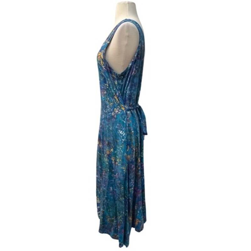 Eagle Ray Traders Batik Print Dress
100% Rayon
With Pockets!
Teal,  Moss, Yellow, Purple, and Burnt Orange
Size: Large