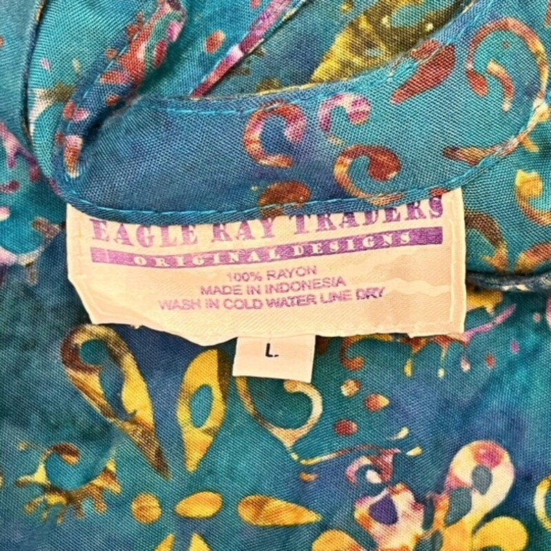 Eagle Ray Traders Batik Print Dress<br />
100% Rayon<br />
With Pockets!<br />
Teal,  Moss, Yellow, Purple, and Burnt Orange<br />
Size: Large