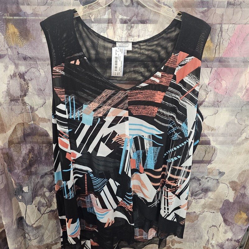 Layered tank with flattering cut for any body style in black white and multi colored print.