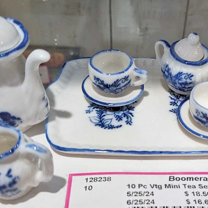 10 Piece Vintage Minature Tea Set,

White with blue floral design
Tray is 4.5 x 3
Other pieces range from .5 In to 2 In

Cute as can be!