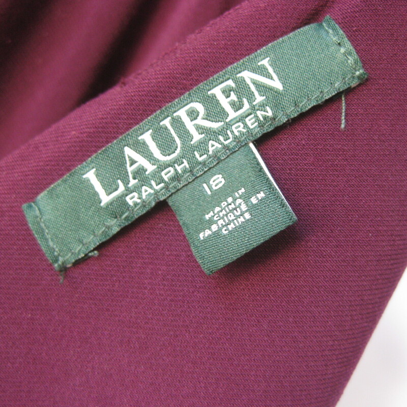 NWT LRL Jewel Bellslv, Plum, Size: XL<br />
Formal featuring beautiful 2 tiered bell sleeves and discrete beading at the shoulder.<br />
Draped and ruched to one side with a long slit at that hip.<br />
NWT by Lauren Ralph Lauren<br />
size 18<br />
polyester jersey with stretch<br />
flat measurements:<br />
armpit to armpit: 21<br />
waist: 18.5<br />
hip: 24<br />
length: 60<br />
underarm sleeve seam: 16<br />
slit: 25<br />
<br />
thanks for looking!<br />
#72507