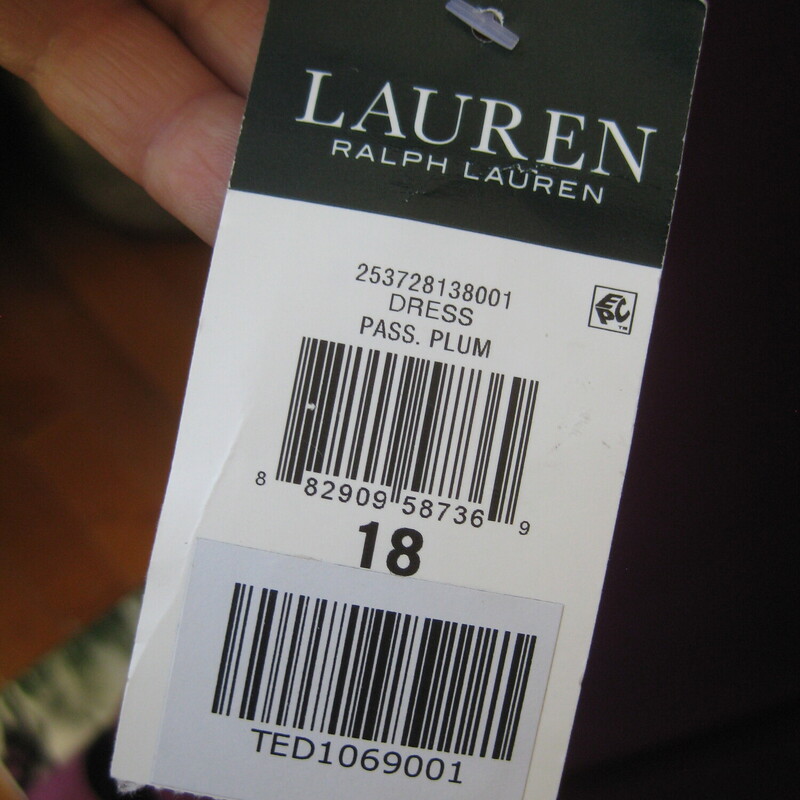 NWT LRL Jewel Bellslv, Plum, Size: XL<br />
Formal featuring beautiful 2 tiered bell sleeves and discrete beading at the shoulder.<br />
Draped and ruched to one side with a long slit at that hip.<br />
NWT by Lauren Ralph Lauren<br />
size 18<br />
polyester jersey with stretch<br />
flat measurements:<br />
armpit to armpit: 21<br />
waist: 18.5<br />
hip: 24<br />
length: 60<br />
underarm sleeve seam: 16<br />
slit: 25<br />
<br />
thanks for looking!<br />
#72507