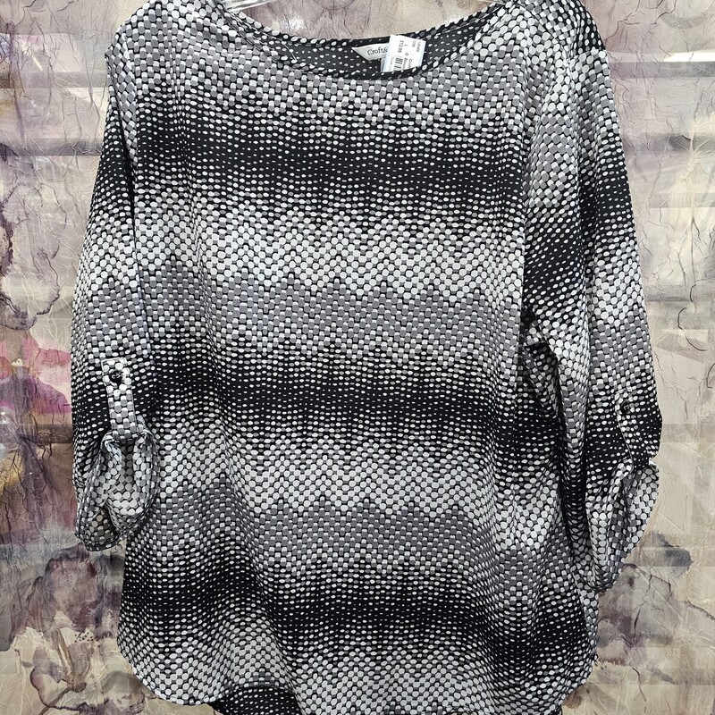Half sleeve blouse in black white and grey print.