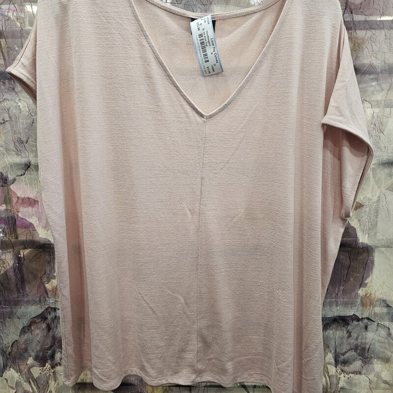 Wardrobe staple piece in a short sleeve super soft pink knit top. Good for every day - year round.