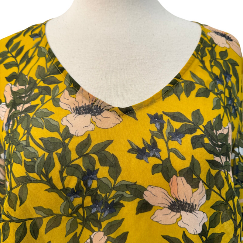 CAbi Scene Floral Top<br />
With Bell Sleeves<br />
Yellow with Olive Blue and Pink<br />
Size: Small