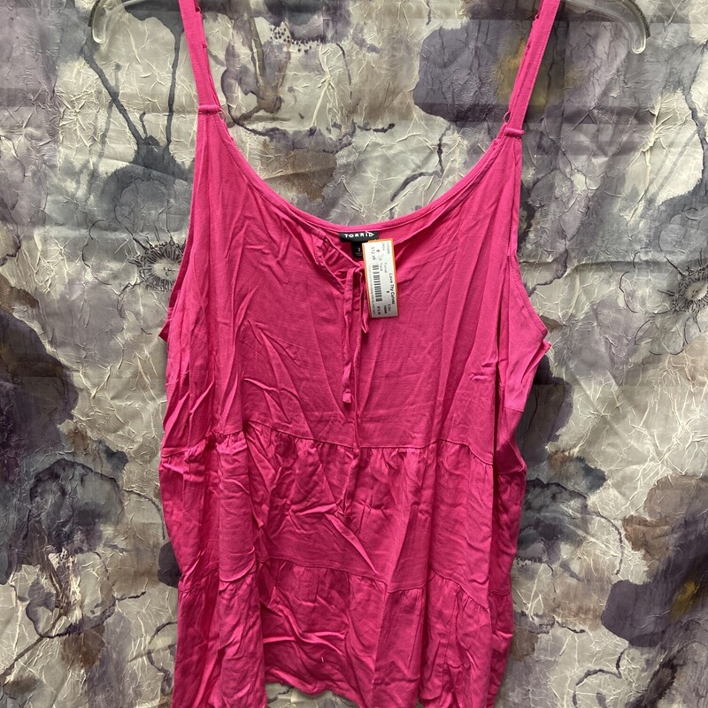 Tank style top in pink with slight baby doll cut.