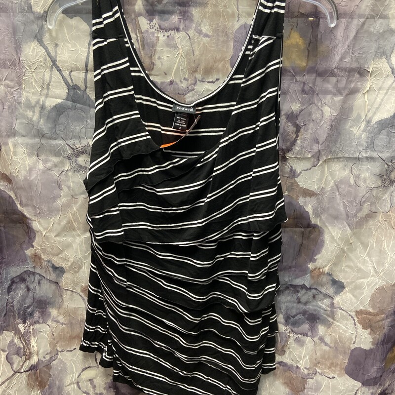 Black and white striped knit tank with ruffled design.