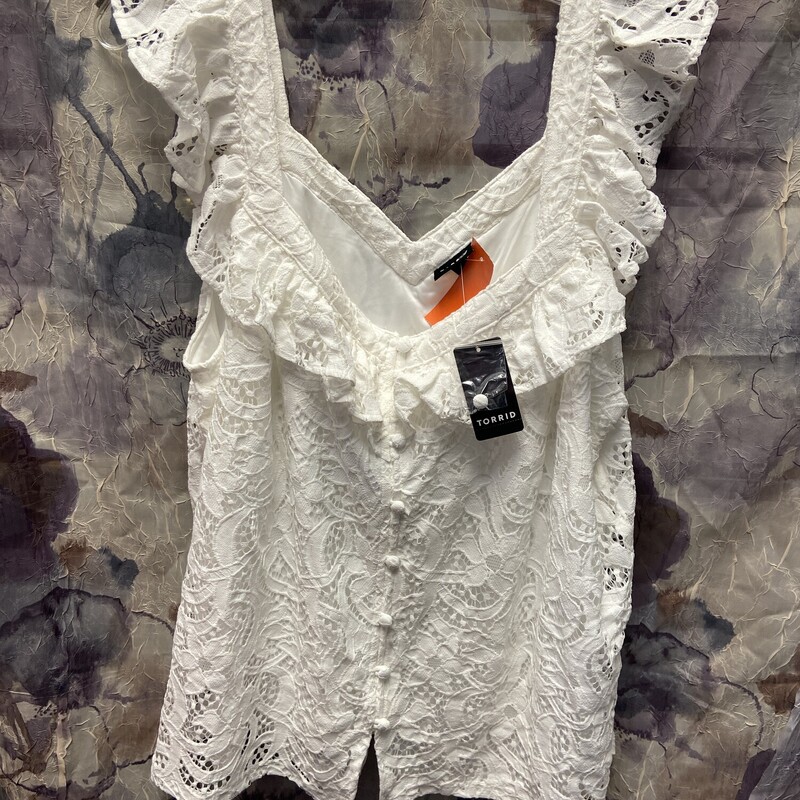 Brand new with tags and done in white. This tank style blouse is super cute and lacey.