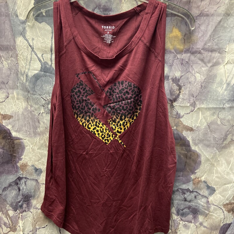 Brand new with tags and retails for $40. This tank is done in burgandy and has leopardprint graphic on front