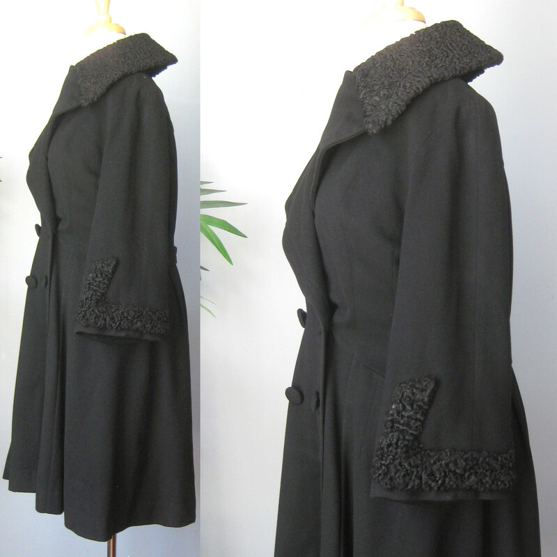 Vtg 40s Wool P. Lamb, Black, Size: Small<br />
This gorgeous black coat from the 1940s or 50s features a large collar and cuffs trimmed in black persian lamb, a fitted waist and a full skirt. It has an attached half belt across the back waist.    It has four buttons arranged in double breasted style.  The fabric is smooth wool.   Fully lined with pockets.  the lining is a charmuese satin and between it and the outer body of the coat is a thick insulation layer.<br />
 So this coat is built for style and function and will keep you toasty warm in any weather.<br />
<br />
The dramatic silhouette works for day or evening looks.<br />
<br />
Here are the flat measurements, please double where appropriate:<br />
Should to shoulder: 17<br />
Armpit to Armpit: 21.5<br />
Waist: 18<br />
Hip: 25.5<br />
Length: 40.25<br />
<br />
Excellent vintage condition, no flaws!<br />
Thank you for looking.<br />
#70405