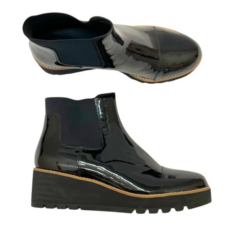 Eileen Fisher The Chelsea Boot<br />
<br />
Redefined by a chunky wedge heel and lugged sole. A modern take on a classic in sleek patent leather.<br />
<br />
1-inch heel, 1/2-inch platform. 4-inch shaft height.<br />
Elastic panels at side and back, lug sole.<br />
Color: Black<br />
Size: 11